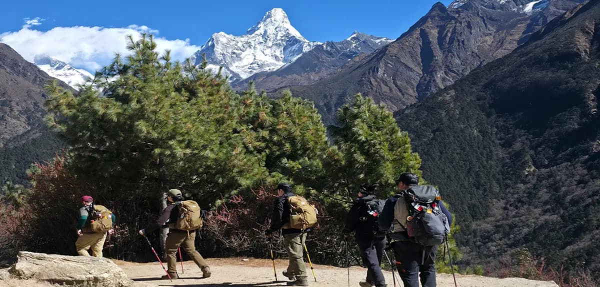 Trekkers on the EBC trail / Khumbu teahouses Trekkers on the Everest Base Camp trail in the Khumbu region, unaffected by the August 2026 Nepal floods