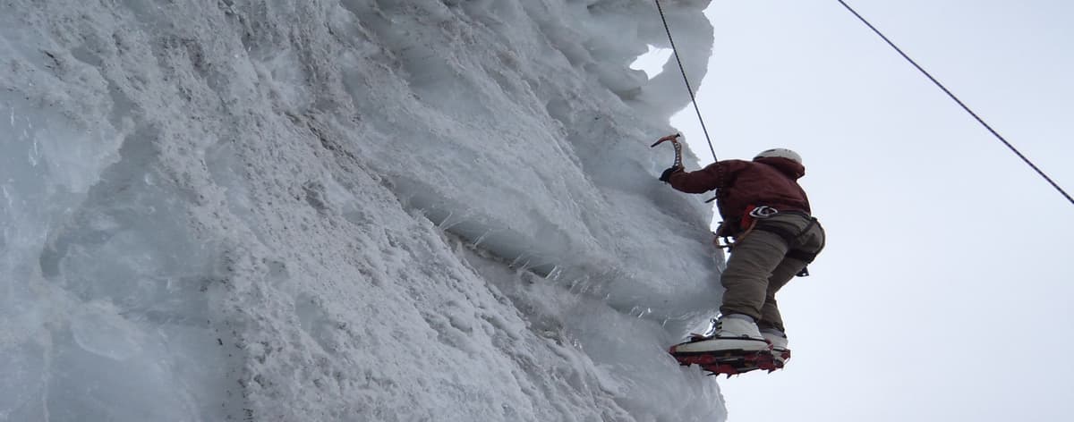 island-peak-ascender-jumar-headwall Climber using an ascender (jumar) on Island Peak's fixed-rope headwall
