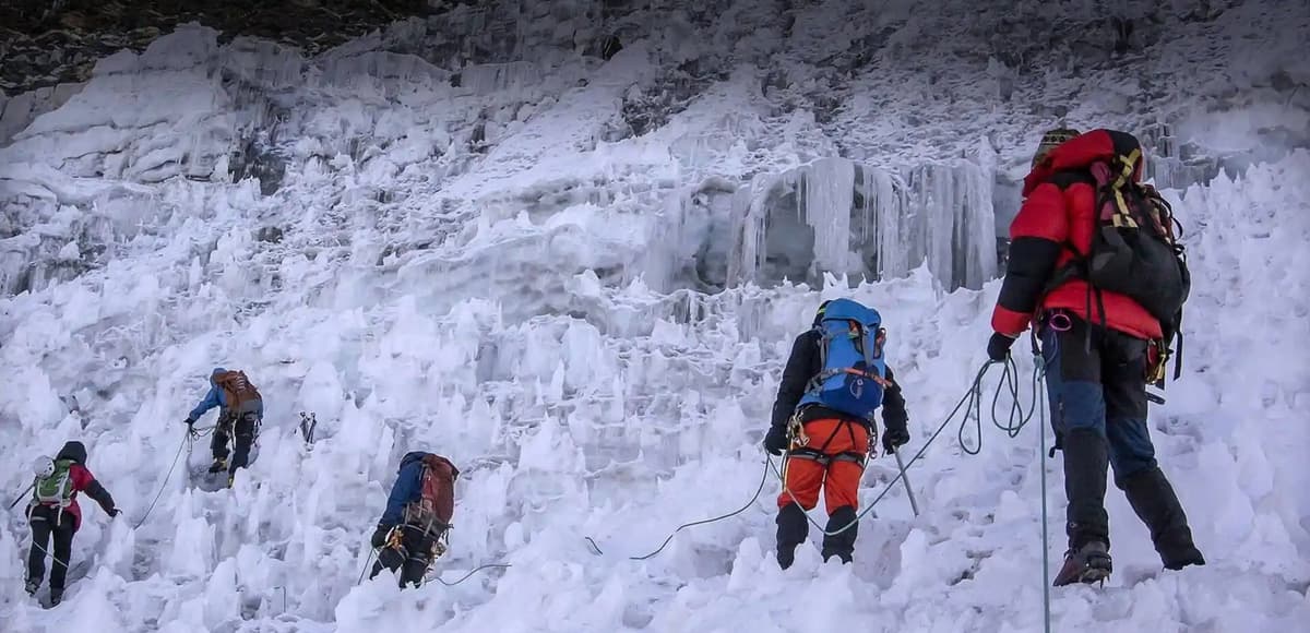 accessible-adventure-licensed-guide-island-peak-team Accessible Adventure licensed guide with climbers on an Island Peak expedition
